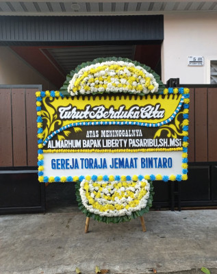 Papan Bunga Duka di Pasar Manna
